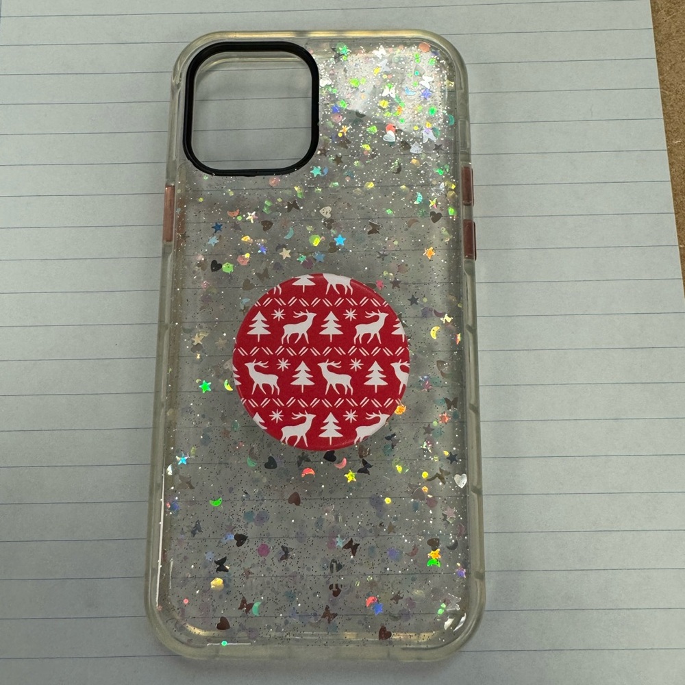 iPhone 12 Pro with pop socket.